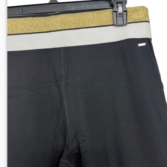 Pink Victoria’s Secret Womens active
Black Leggings with gold and white waist - Picture 3 of 6